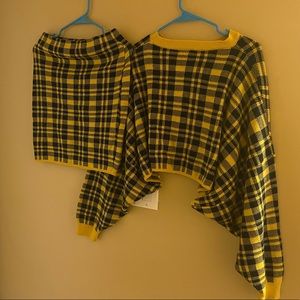 Yellow & black two piece skirt set with a long sleeve sweater.